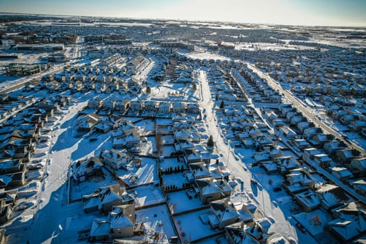 Captivating aerial shot of Stonebridge in Saskatoon, highlighting the harmonious blend of modern architecture and Saskatchewan's verdant surroundings.
