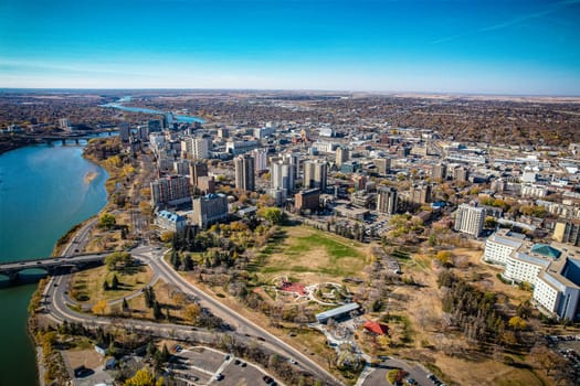 Aerial spectacle of downtown Saskatoon, revealing the city's architectural marvels, bustling streets, and the pulsating core of Saskatchewan's metropolis