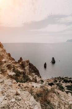 Aerial panoramic view of beautiful sunset above sea. Beautiful seascape. Sun glare, small waves on the water surface. Evening. Horizon. Nobody. No people. Copy space. Never-ending beauty of nature