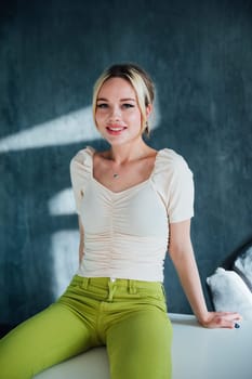 Beautiful woman sitting on the table