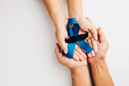 November, embrace Prostate Cancer Awareness with light Blue Ribbon featuring a mustache symbol of support for men's health. Ideal for healthcare, International Men's Day, World Cancer Day concepts.