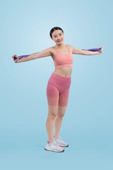 Vigorous energetic woman in sportswear portrait stretching resistance sport band. Young athletic asian woman strength and endurance training session workout routine concept on isolated background.