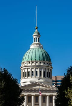 Dome of the old Courthouse in St Louis Missouri against the blue sky as renovations take place inside