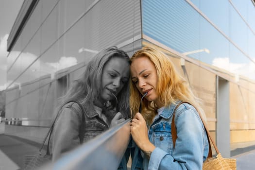 A girl with a thoughtful face who wants to show off herself in a store window. High quality photo