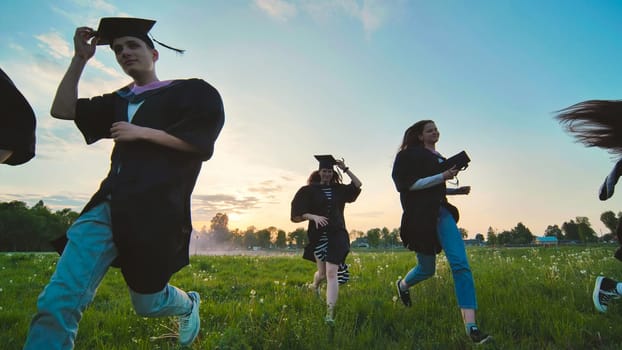 College alumni run at sunset in the evening.