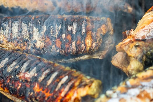 Grilled fish on charcoal grill. Fresh fish barbecue