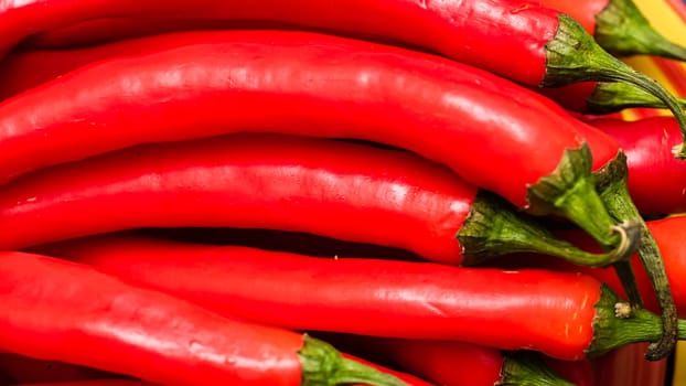 Red hot chilli peppers, close up. Background of red chilies