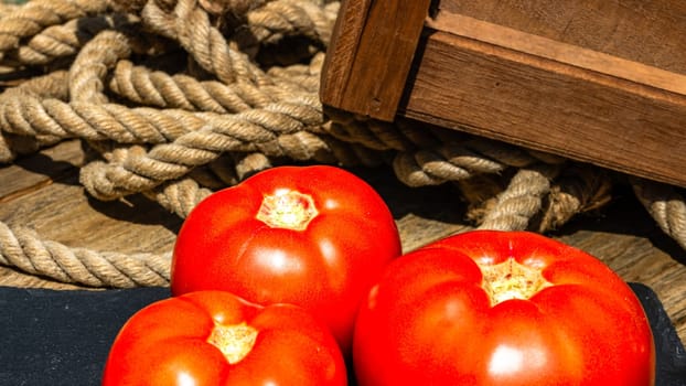 Close up of fresh ripe tomatoes isolated in a rustic composition,