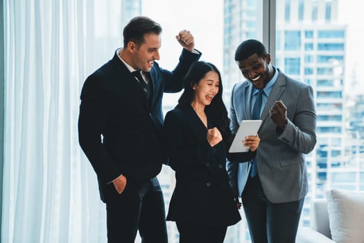Professional happy diverse business team celebrate their successful project. Group of happy successful businesspeople applause, enjoy with increasing sales. Successful business team work. Ornamented.