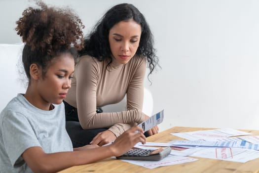 Stressed African American women has financial problems with credit card debt to pay crucial show concept of bad personal money and mortgage pay management crisis.