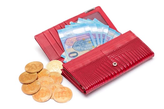 Opened Red Women Purse with 20 Euro Banknotes Inside and Bitcoin Coins - Isolated on White Background. A Wallet Full of Money Symbolizing Wealth, Success, Shopping and Social Status - Isolation