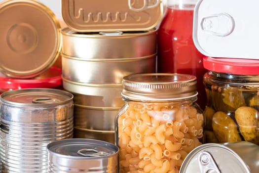 Food Reserves: Canned Food, Spaghetti, Pate, Tuna, Tomato Juice, Pasta, Fish and Grocery. Emergency Food Storage in Case of Crisis. Strategic Food Supplies