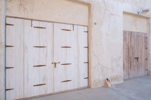 Arabic style carved wooden doors in Al Fahidi Historical District, Deira, Dubai, United Arab Emirates