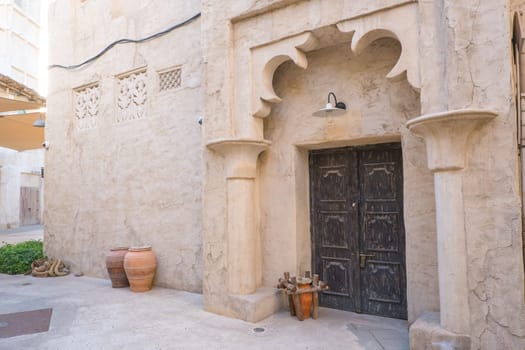 Arabic style carved wooden doors in Al Fahidi Historical District, Deira, Dubai, United Arab Emirates