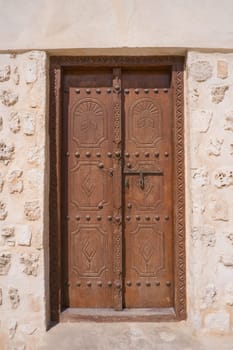 Old gate in the old district of Sharjah city.