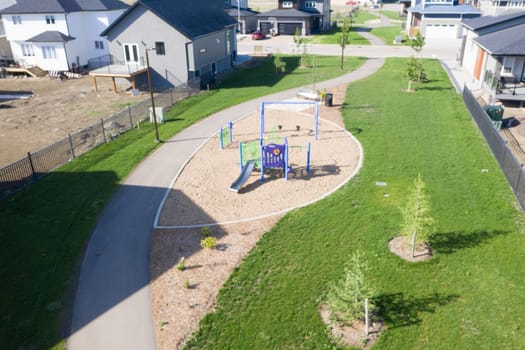 Explore the scenic beauty of Bidulka Park in Saskatoon. Captured here is the park's lush greenery, tranquil walking paths, and picturesque pond, a perfect spot for relaxation and nature walks.