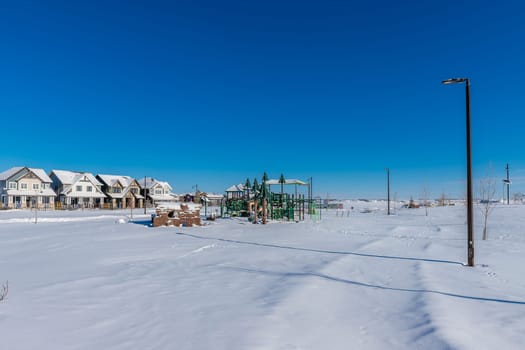 Experience the winter magic of Bear Paw Park in Saskatoon. This image captures the park's snowy landscape, frost-covered trees, and the serene beauty of a winter's day in the city.