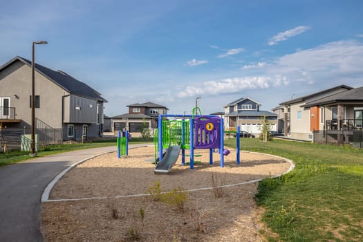 Explore the scenic beauty of Bidulka Park in Saskatoon. Captured here is the park's lush greenery, tranquil walking paths, and picturesque pond, a perfect spot for relaxation and nature walks.