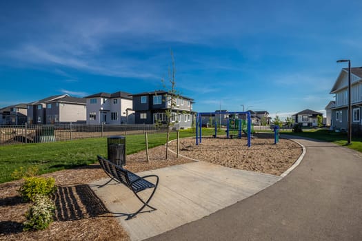 Explore the scenic beauty of Bidulka Park in Saskatoon. Captured here is the park's lush greenery, tranquil walking paths, and picturesque pond, a perfect spot for relaxation and nature walks.