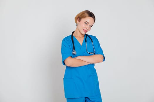 a female doctor in blue suit with phonendoscope stethoscope in hospital hospital