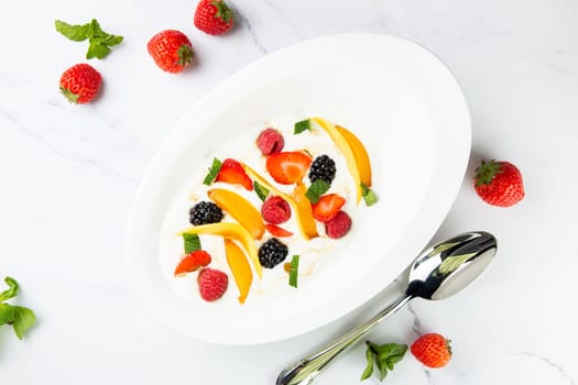 fruit salad with wild berries and strawberries