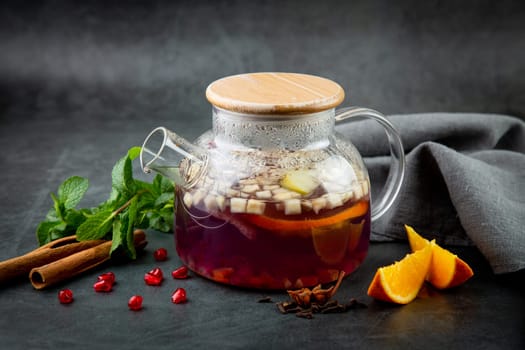 hot homemade tea with cinnamon, lemon and mint