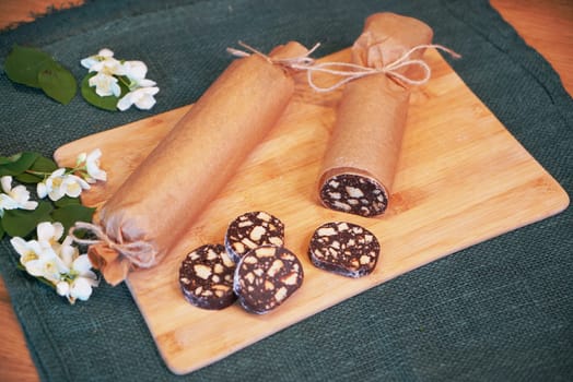 Beautiful chocolate salami on the table in 4k