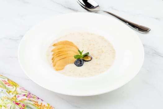 healthy breakfast with fruits in a white plate