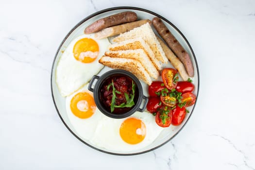 Breakfast of eggs and vegetables with cherry tomatoes and slices of bread