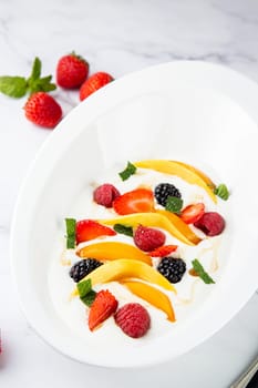 fruit salad with wild berries and strawberries