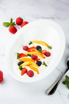 fruit salad with wild berries and strawberries