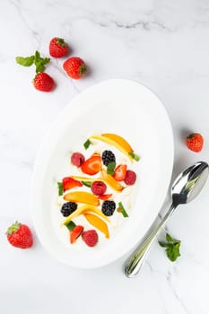 fruit salad with wild berries and strawberries