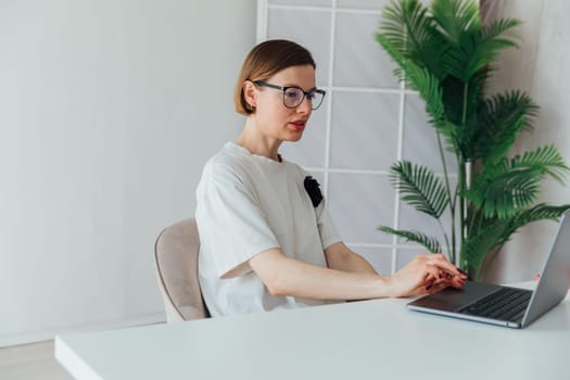 Business woman working remotely in office