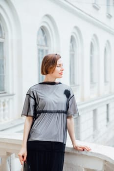 Portrait of slender fashionable brunette woman