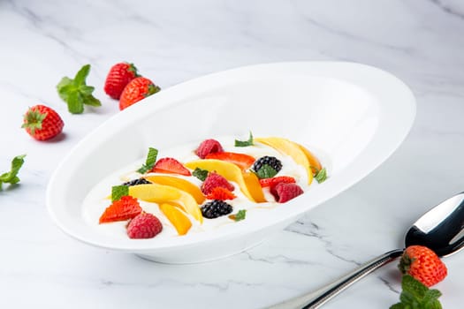 fruit salad with wild berries and strawberries