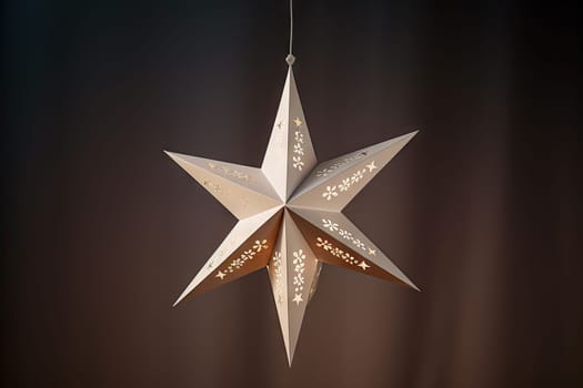 A Shimmering White Paper Star Hanging From a Delicate String Created With Generative AI Technology