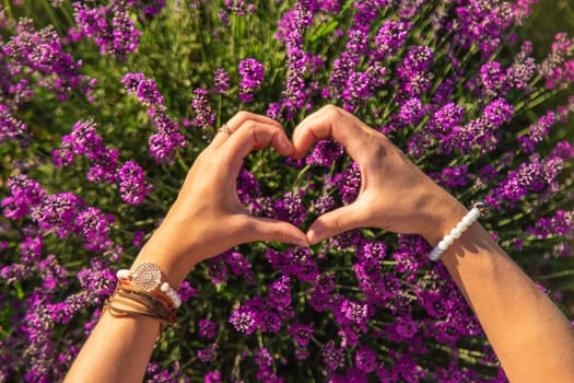 Woman in a lavender field. Selective focus. Nature.