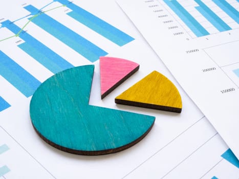 Papers with graphs and chart as a symbol of segmentation analysis.