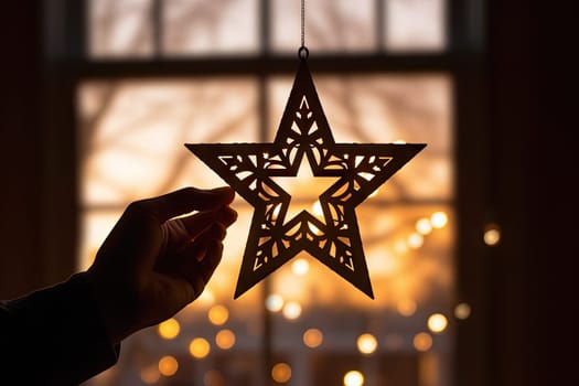 Shining Brightly: A Person Holding a Star Shaped Ornament in Front of a Window Created With Generative AI Technology