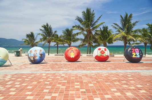 Da Nang, Vietnam - Juny 27, 2023: View of the seafronts on the south end of the golden sand beach My Khe, Danang beach on a sunny day. High quality photo