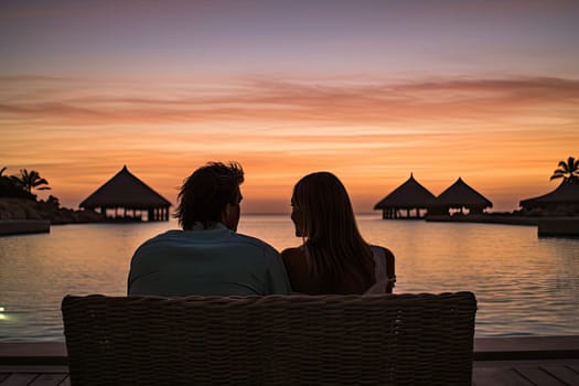 A Serene Moment: A Man and a Woman Sharing a Bench, Enjoying the Beautiful Sunset