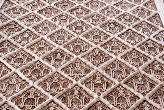 Oriental decorated carved wall at a religious building in Morocco