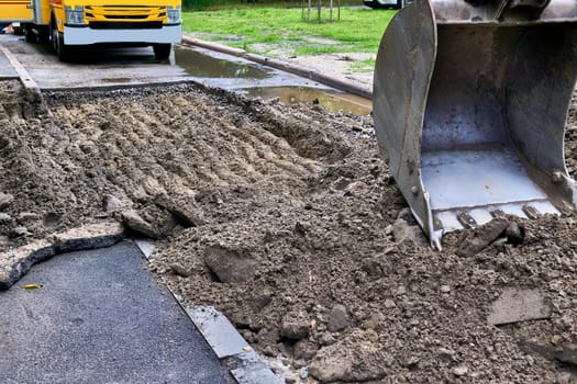 a wheeled machine for leveling the ground, especially in making roads