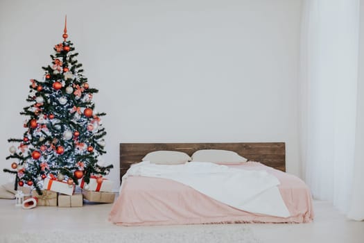 bedroom with a new year tree bed 2018 2019