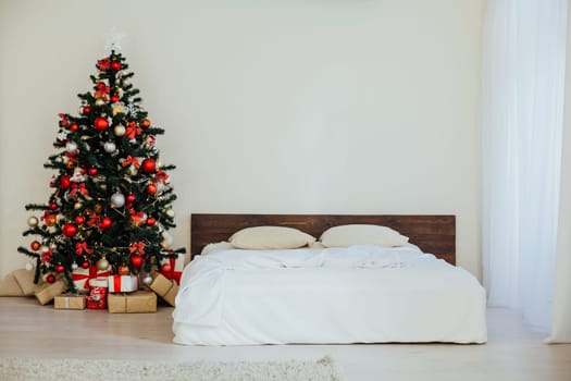 bedroom with rozhdetvenskim new year tree decoration bed 2018 2019