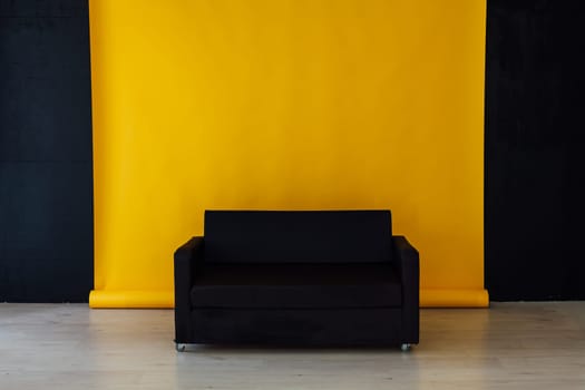 sofa in the interior of the yellow room