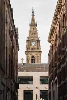 Liverpool, UK - Oct 07, 2023 - Vertical shot of Liverpool municipal building Clock tower on Dale street. Architecture exterior of The Municipal Hotel Liverpool, Space for text, Selective focus.