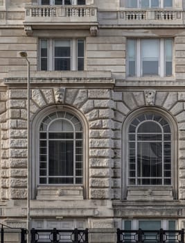 Liverpool, UK - Oct 07, 2023 - The glass window frame exterior of The cunard building. Pier Head, Glass window and wall, One of the Three Graces of Liverpool waterfront, Space for text, Selective focus.