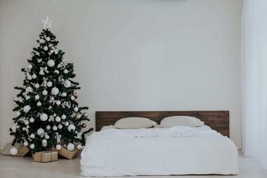 bedroom with rozhdetvenskim new year tree decoration bed 2018 2019