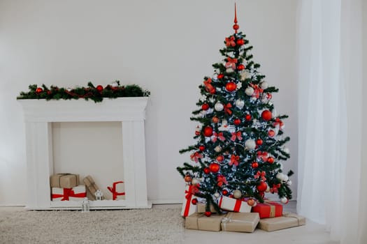 room decorated for the Christmas holidays new year tree gifts 2018 2019